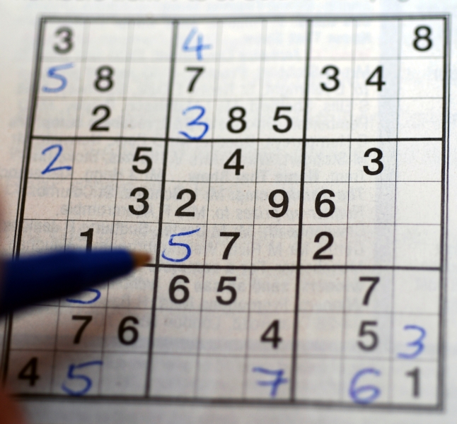 242440-playing-sudoku